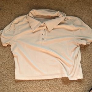 This is a white collared cropped button tee